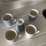 Set of 5 matching newgrange mugs Image 3
