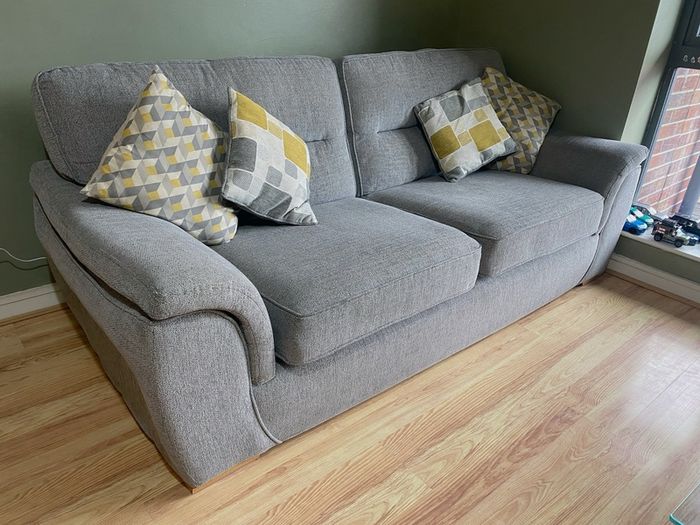 Harvey Norman Sofa. 3 Seats and 4 Cushions Included