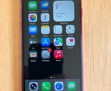 256GB gorgeous red iPhone SE 2 (unlocked) with original box and new charging cable.