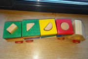 Wooden shape sorter truck