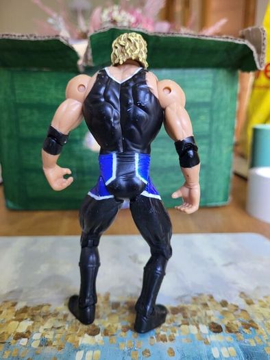 Christian wrestling action figure black and blue gear loose