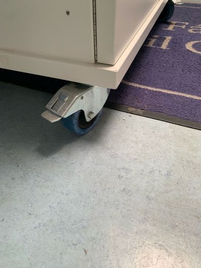 Large laptop storage and charging unit