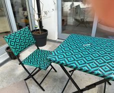bistro table and two chairs