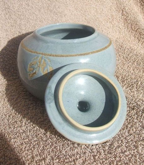 A studio pottery vase with its lid (excellent condition, no damage).