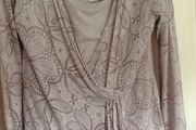Long sleeve top with inset and rouching over stomach. Chianti