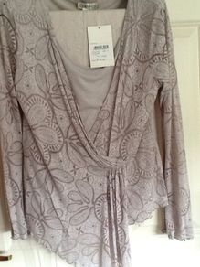 Long sleeve top with inset and rouching over stomach. Chianti