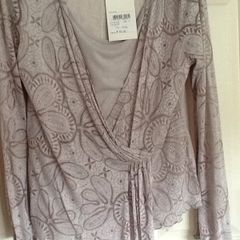 Long sleeve top with inset and rouching over stomach. Chianti