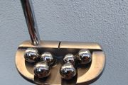 Putting with Balls