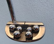 Putting with Balls