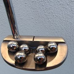 Putting with Balls