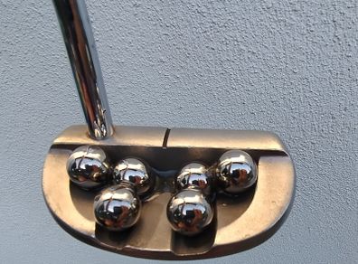 Putting with Balls