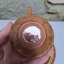 Brown and beige teacup and saucer Image 4