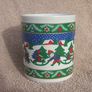 A vintage Christmas mug by Kilncraft (early 1980s) - children at play with snow-sledge design Image 2