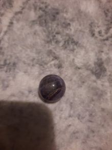small polished amethyst sphere