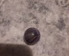 small polished amethyst sphere