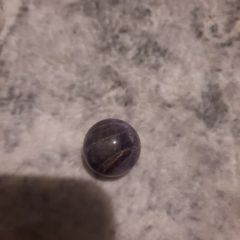 small polished amethyst sphere