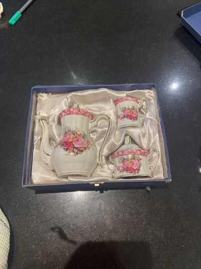 Vintage Porcelain small teapot sugar bowl and creamer set .       porcelain