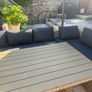 10 seater rattan garden set with dark navy cushions Image 6