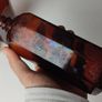313 - Set of 3 Beautiful Vintage Decorative Collectible Dark Amber Glass Milton Bottles Image 8
