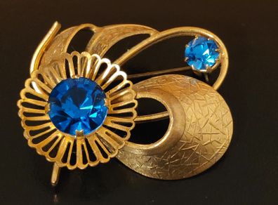Stunning vintage gold tone metal & blue glass brooch