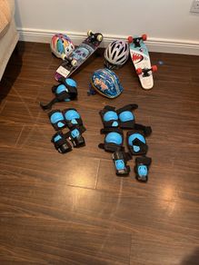 2 skateboard sets as new with helmets and knee,elbow and wrist protectors.