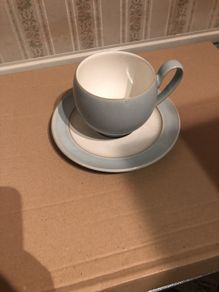 Denby cup and saucer Light Green blue colour