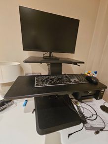 Standing desk adaptor - sit and stand with air lever