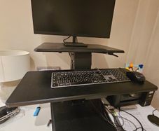 Standing desk adaptor - sit and stand with air lever