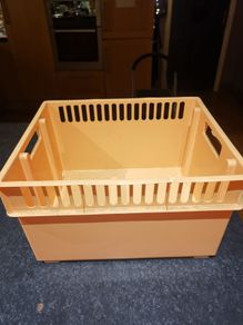 Orange plastic storage box
