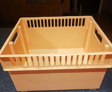Orange plastic storage box