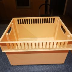 Orange plastic storage box