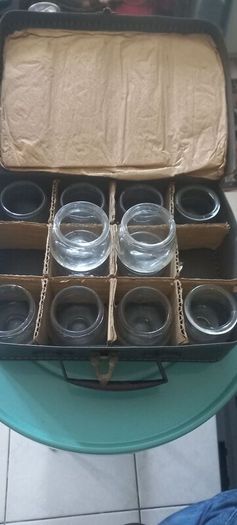 vintage set of 12 jars in lovely leather carry case