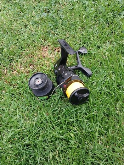 fishing reel + spare spool.