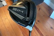 Taylormade sim driver with upgraded tour ad shaft