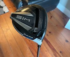 Taylormade sim driver with upgraded tour ad shaft