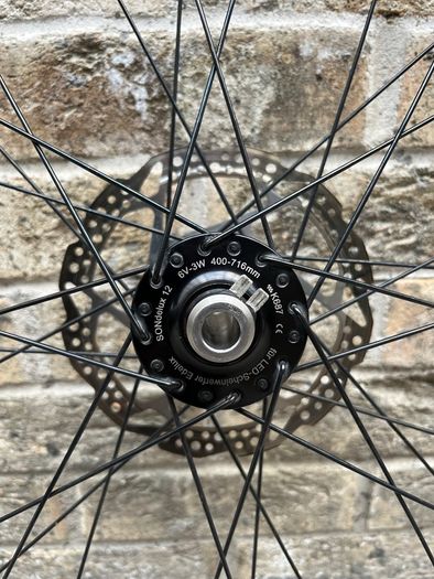 Premium SONdelux Dynamo Front Wheel (700c / Disc / 12mm Thru-Axle)