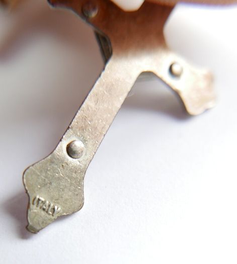 Collection of five religious crucifix and cross pendants
