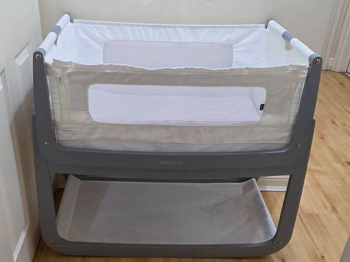 Dark gray bed side cot.
