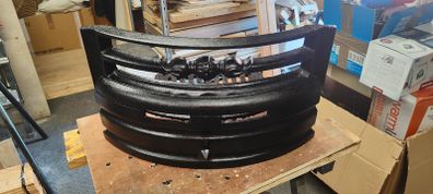 Fire front and grate