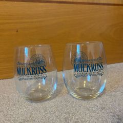A Pair of clear stemless Muckross Irish Gin glasses