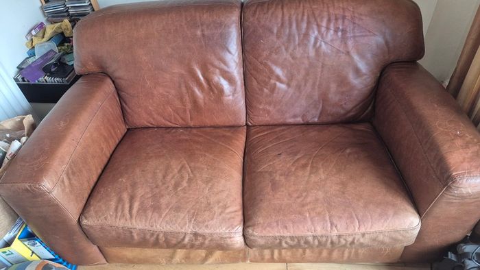 Two x 2 seater brown leather sofas for free