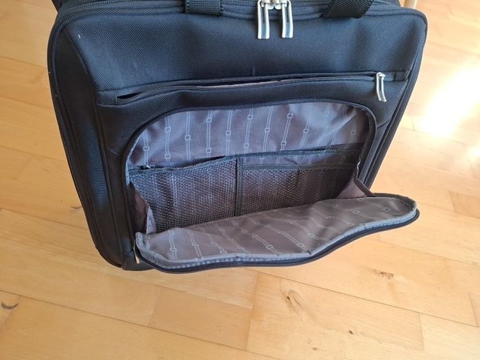 Delsey wheelie suitcase.