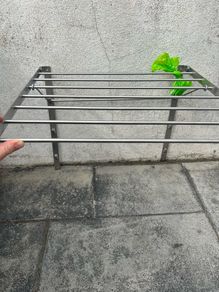 Wall mounted clothes drying rack