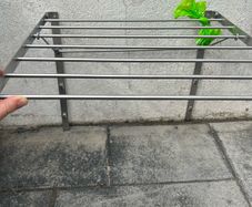 Wall mounted clothes drying rack