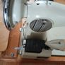 2 Sewing Machine one does zigzag right side main photo the other in left straight only just need a. Puller.  Both working Image 9