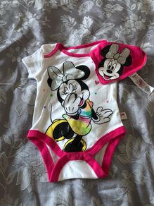 Baby grow and bib never used 6/9 mths