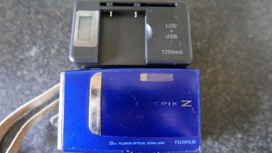 Fujifilm FinePix Z Series Z10fd 10.0MP Digital Camera w/Battery , universal charger and 1Gb SD Card