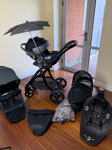 As New Egg2 travel system with Cybex car seat and isofix base swivel