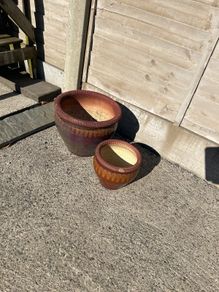 Pair of brown glazed garden pots