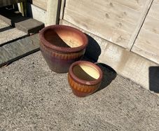 Pair of brown glazed garden pots